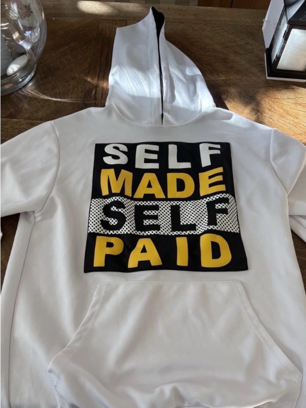 Sacred Crown White Hoodie with Bold "SELF MADE SELF PAID" Graphic. XL
